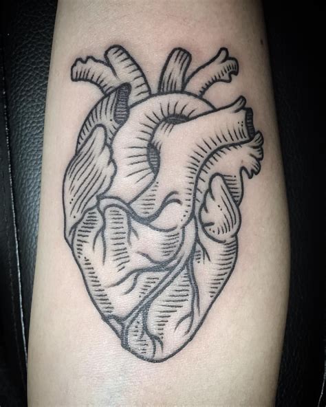 tattoos in the heart|realistic heart tattoo designs.